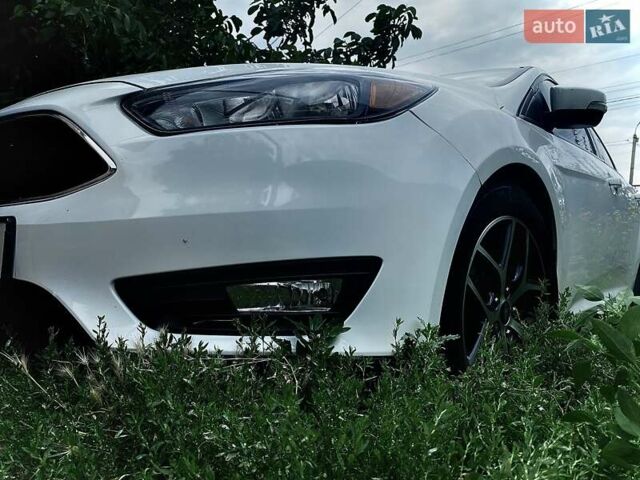 Білий Форд Фокус, об'ємом двигуна 2 л та пробігом 148 тис. км за 8888 $, фото 8 на Automoto.ua