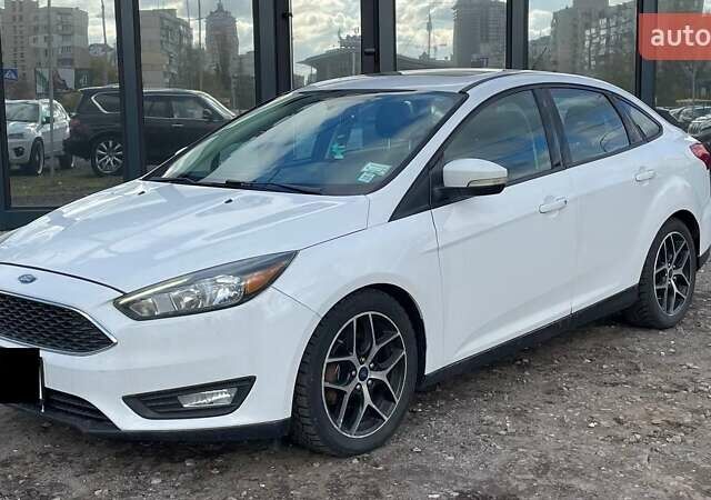 Белый Форд Фокус, объемом двигателя 2 л и пробегом 240 тыс. км за 8290 $, фото 2 на Automoto.ua