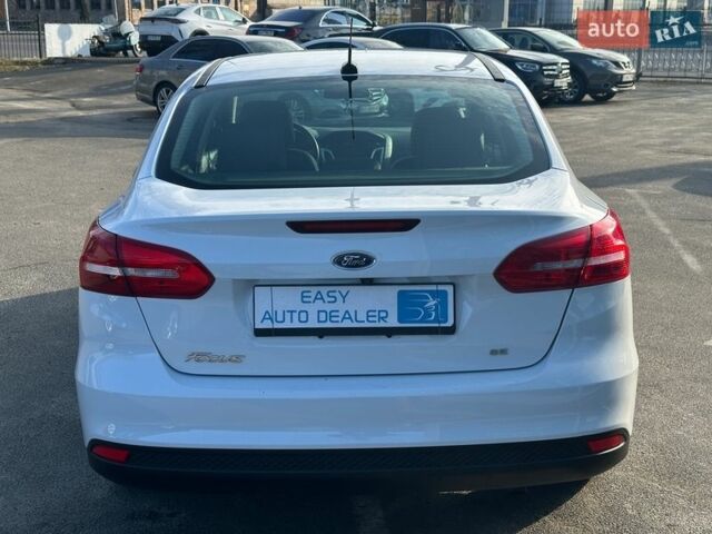 Білий Форд Фокус, об'ємом двигуна 2 л та пробігом 127 тис. км за 8990 $, фото 5 на Automoto.ua