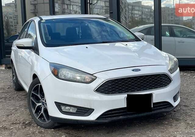 Белый Форд Фокус, объемом двигателя 2 л и пробегом 240 тыс. км за 8290 $, фото 6 на Automoto.ua