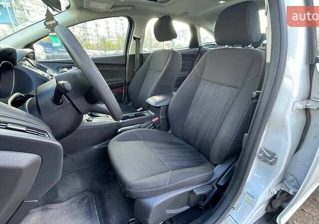 Белый Форд Фокус, объемом двигателя 2 л и пробегом 240 тыс. км за 8290 $, фото 8 на Automoto.ua