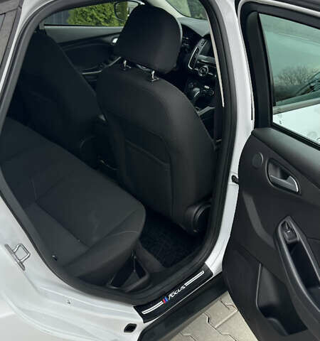 Білий Форд Фокус, об'ємом двигуна 2 л та пробігом 168 тис. км за 9000 $, фото 10 на Automoto.ua