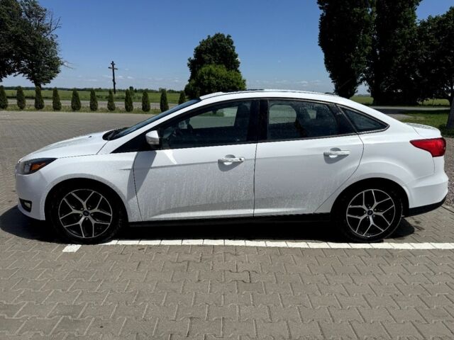 Белый Форд Фокус, объемом двигателя 2 л и пробегом 240 тыс. км за 7000 $, фото 13 на Automoto.ua