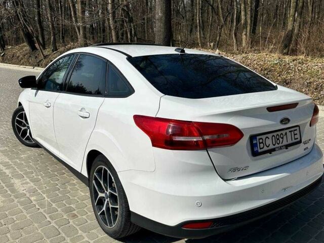 Білий Форд Фокус, об'ємом двигуна 2 л та пробігом 193 тис. км за 10500 $, фото 4 на Automoto.ua