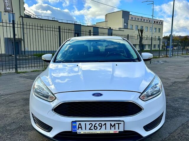 Білий Форд Фокус, об'ємом двигуна 2 л та пробігом 137 тис. км за 8700 $, фото 6 на Automoto.ua