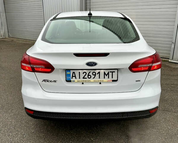 Белый Форд Фокус, объемом двигателя 2 л и пробегом 137 тыс. км за 8700 $, фото 7 на Automoto.ua