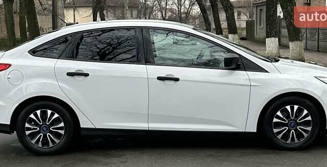 Белый Форд Фокус, объемом двигателя 2 л и пробегом 186 тыс. км за 8900 $, фото 1 на Automoto.ua