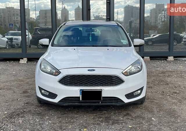 Белый Форд Фокус, объемом двигателя 2 л и пробегом 240 тыс. км за 8290 $, фото 1 на Automoto.ua