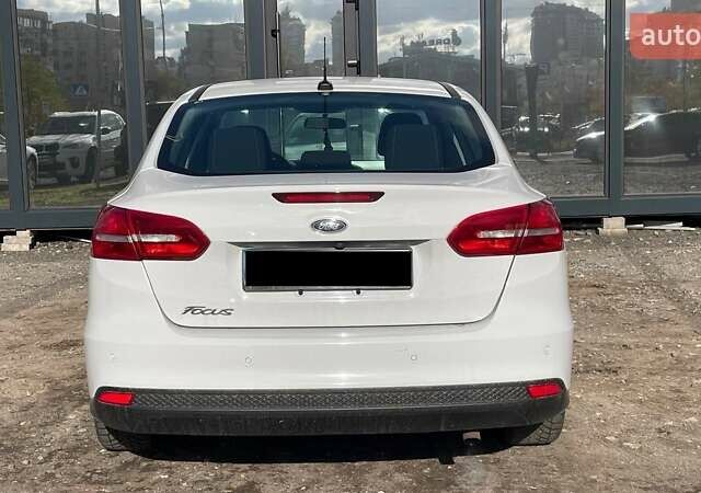 Белый Форд Фокус, объемом двигателя 2 л и пробегом 240 тыс. км за 8290 $, фото 4 на Automoto.ua