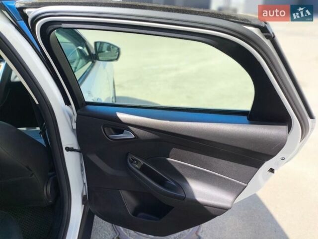 Белый Форд Фокус, объемом двигателя 2 л и пробегом 128 тыс. км за 8699 $, фото 23 на Automoto.ua