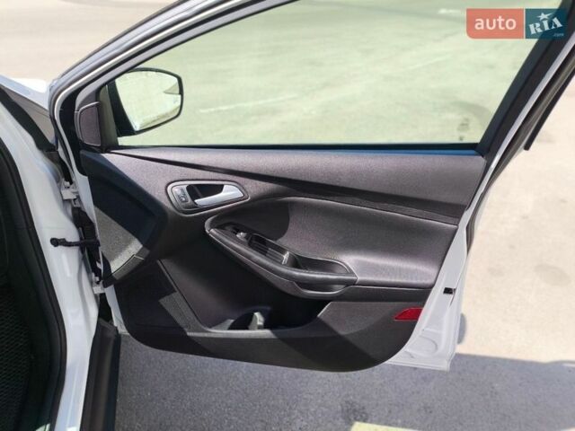 Белый Форд Фокус, объемом двигателя 2 л и пробегом 128 тыс. км за 8699 $, фото 15 на Automoto.ua