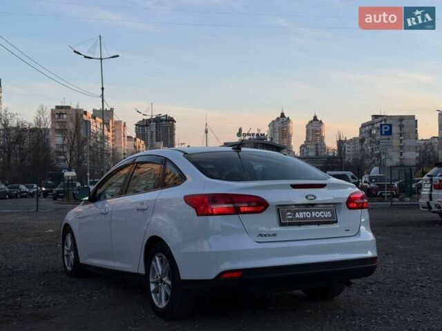 Білий Форд Фокус, об'ємом двигуна 2 л та пробігом 126 тис. км за 9790 $, фото 4 на Automoto.ua