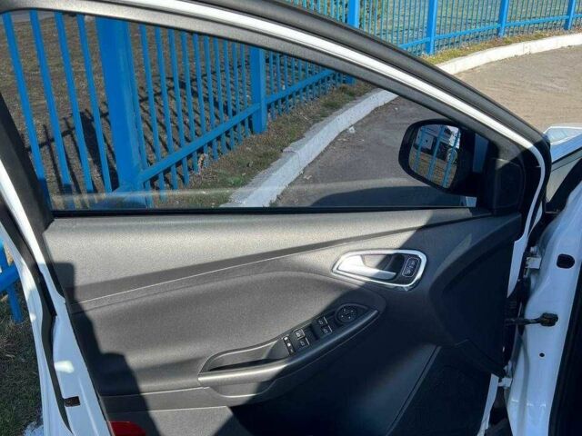 Білий Форд Фокус, об'ємом двигуна 1.6 л та пробігом 67 тис. км за 10700 $, фото 17 на Automoto.ua