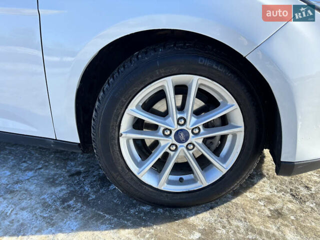 Білий Форд Фокус, об'ємом двигуна 2.01 л та пробігом 60 тис. км за 8500 $, фото 18 на Automoto.ua