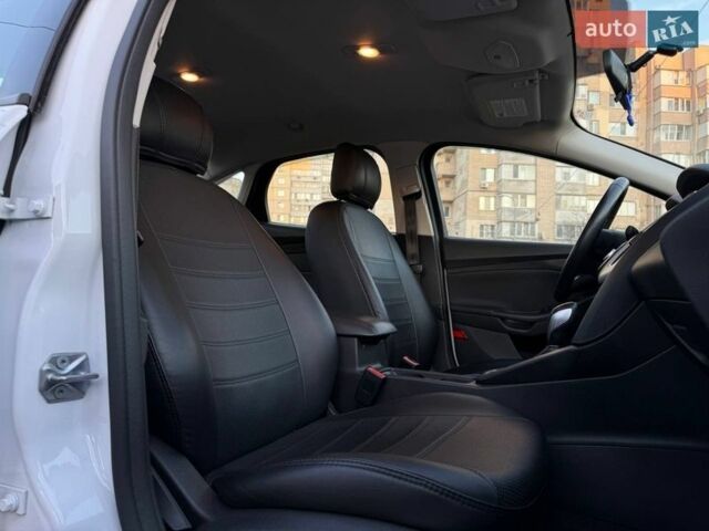 Білий Форд Фокус, об'ємом двигуна 2 л та пробігом 126 тис. км за 9790 $, фото 11 на Automoto.ua