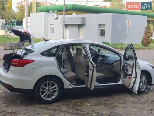 Белый Форд Фокус, объемом двигателя 1 л и пробегом 240 тыс. км за 8300 $, фото 65 на Automoto.ua