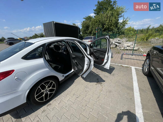 Білий Форд Фокус, об'ємом двигуна 2 л та пробігом 85 тис. км за 9500 $, фото 9 на Automoto.ua