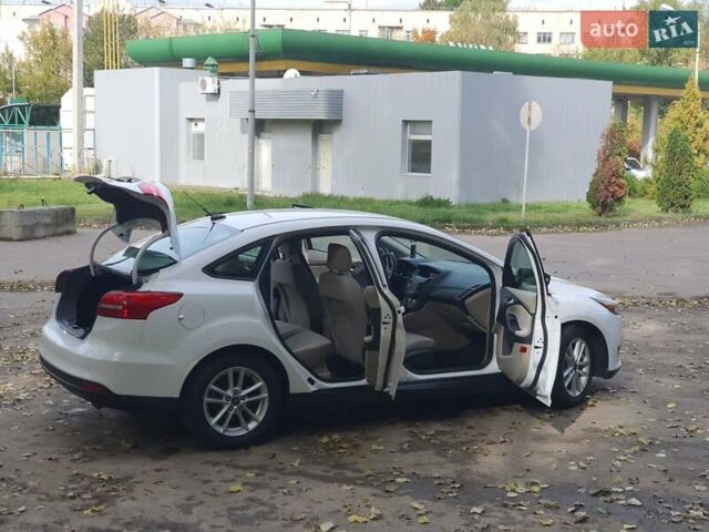 Белый Форд Фокус, объемом двигателя 1 л и пробегом 240 тыс. км за 8300 $, фото 30 на Automoto.ua