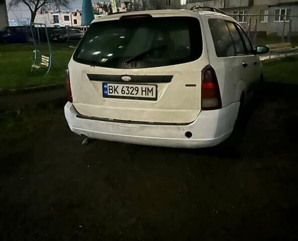 Білий Форд Фокус, об'ємом двигуна 1.8 л та пробігом 452 тис. км за 1900 $, фото 4 на Automoto.ua