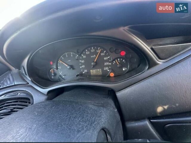 Білий Форд Фокус, об'ємом двигуна 1.8 л та пробігом 452 тис. км за 1900 $, фото 1 на Automoto.ua