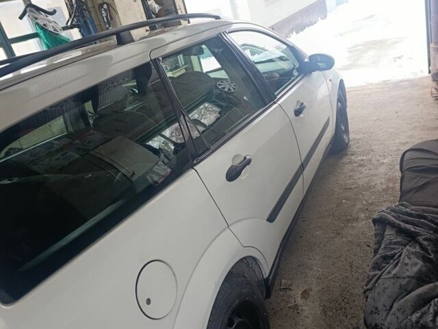 Белый Форд Фокус, объемом двигателя 1.8 л и пробегом 452 тыс. км за 2200 $, фото 14 на Automoto.ua