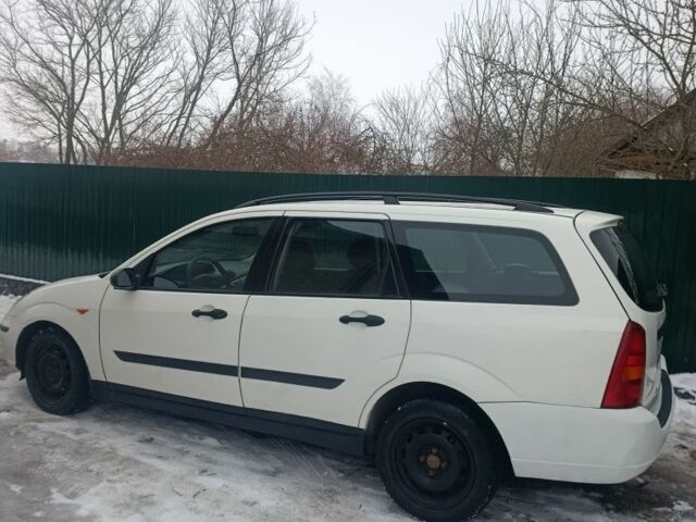 Белый Форд Фокус, объемом двигателя 1.8 л и пробегом 452 тыс. км за 2200 $, фото 3 на Automoto.ua