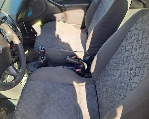 Белый Форд Фокус, объемом двигателя 1.75 л и пробегом 500 тыс. км за 3000 $, фото 12 на Automoto.ua