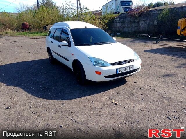 Белый Форд Фокус, объемом двигателя 1.8 л и пробегом 370 тыс. км за 3500 $, фото 1 на Automoto.ua