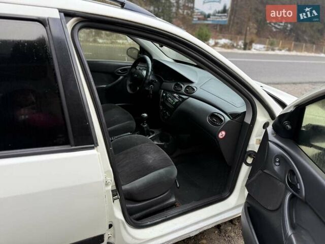 Белый Форд Фокус, объемом двигателя 1.8 л и пробегом 316 тыс. км за 1200 $, фото 10 на Automoto.ua