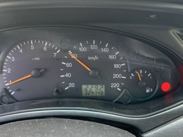 Белый Форд Фокус, объемом двигателя 1.8 л и пробегом 340 тыс. км за 2500 $, фото 2 на Automoto.ua