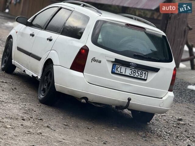 Белый Форд Фокус, объемом двигателя 1.8 л и пробегом 316 тыс. км за 1200 $, фото 19 на Automoto.ua