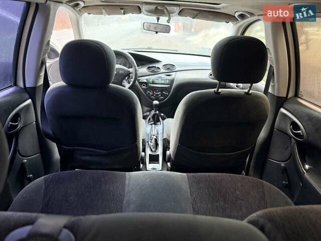 Белый Форд Фокус, объемом двигателя 1.8 л и пробегом 316 тыс. км за 1200 $, фото 14 на Automoto.ua