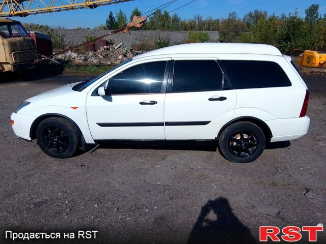 Белый Форд Фокус, объемом двигателя 1.8 л и пробегом 370 тыс. км за 3500 $, фото 4 на Automoto.ua