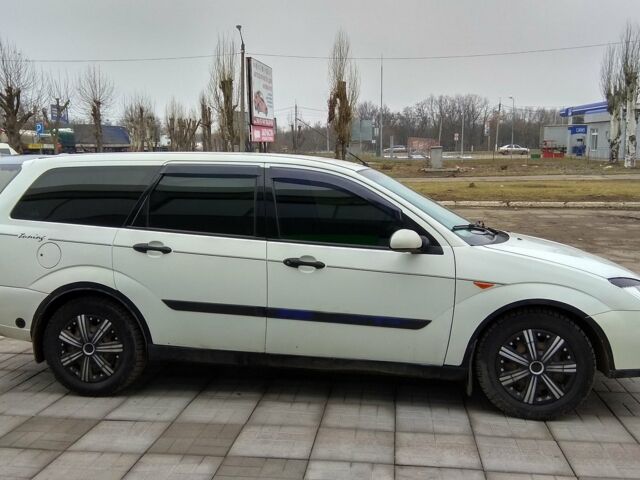 Білий Форд Фокус, об'ємом двигуна 1.8 л та пробігом 241 тис. км за 4400 $, фото 6 на Automoto.ua