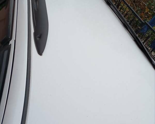 Белый Форд Фокус, объемом двигателя 2 л и пробегом 212 тыс. км за 2699 $, фото 3 на Automoto.ua