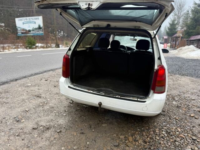 Белый Форд Фокус, объемом двигателя 1.8 л и пробегом 216 тыс. км за 1000 $, фото 7 на Automoto.ua