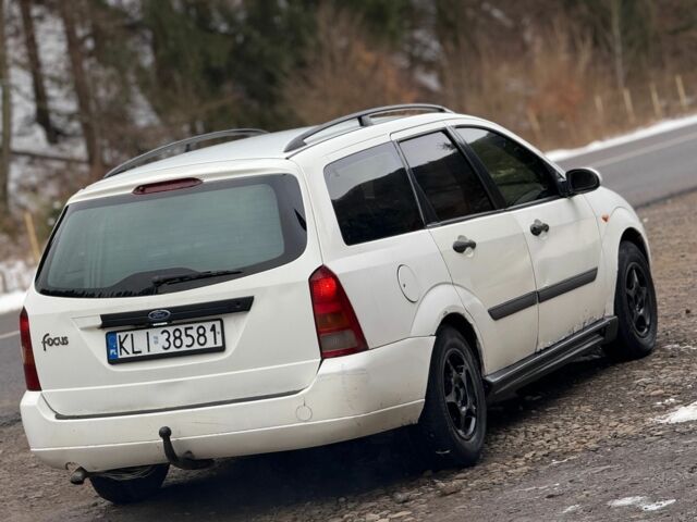 Белый Форд Фокус, объемом двигателя 1.8 л и пробегом 216 тыс. км за 1000 $, фото 2 на Automoto.ua