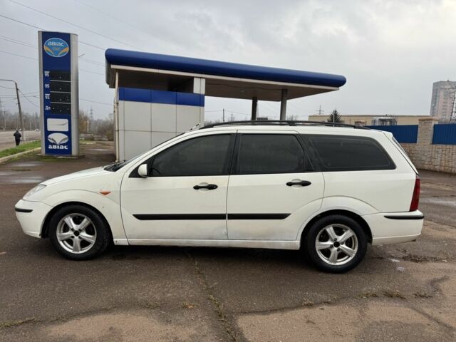 Білий Форд Фокус, об'ємом двигуна 1.8 л та пробігом 280 тис. км за 2600 $, фото 5 на Automoto.ua