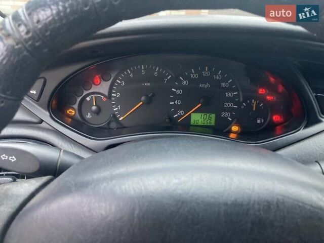 Белый Форд Фокус, объемом двигателя 1.6 л и пробегом 301 тыс. км за 3300 $, фото 6 на Automoto.ua