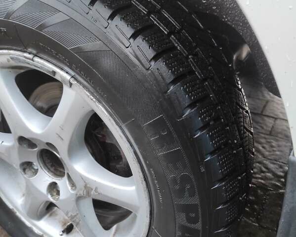 Белый Форд Фокус, объемом двигателя 1.6 л и пробегом 281 тыс. км за 4200 $, фото 9 на Automoto.ua