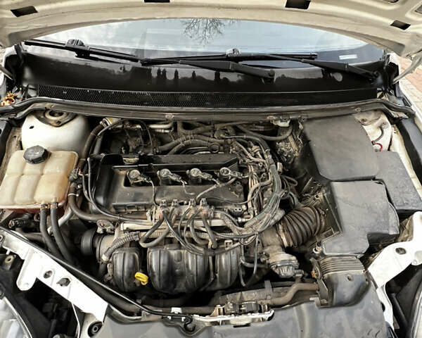 Белый Форд Фокус, объемом двигателя 1.8 л и пробегом 245 тыс. км за 4800 $, фото 21 на Automoto.ua