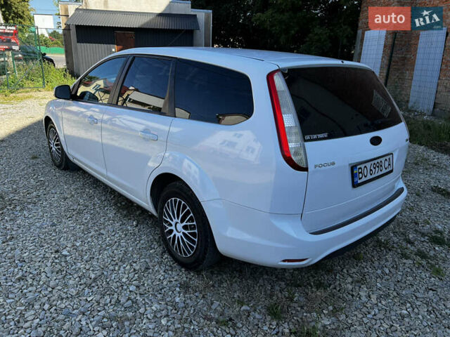 Білий Форд Фокус, об'ємом двигуна 1.8 л та пробігом 244 тис. км за 5450 $, фото 7 на Automoto.ua
