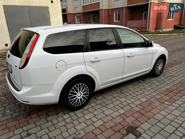 Белый Форд Фокус, объемом двигателя 1.8 л и пробегом 245 тыс. км за 4800 $, фото 7 на Automoto.ua