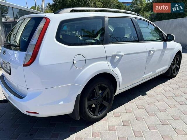 Білий Форд Фокус, об'ємом двигуна 1.8 л та пробігом 227 тис. км за 6000 $, фото 4 на Automoto.ua