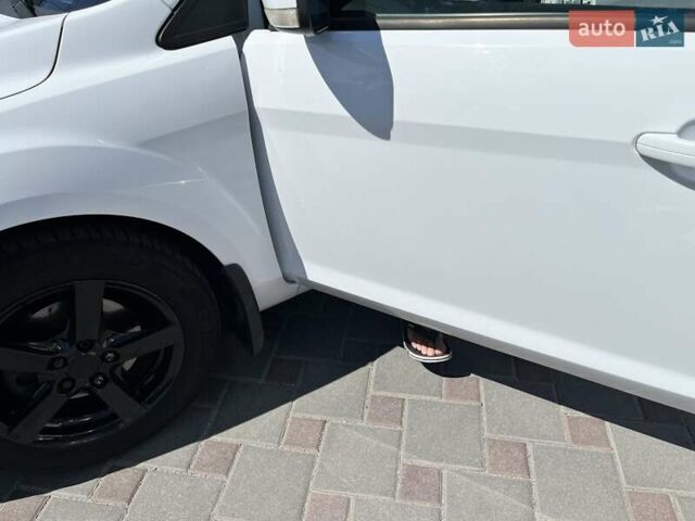 Білий Форд Фокус, об'ємом двигуна 1.8 л та пробігом 227 тис. км за 6000 $, фото 11 на Automoto.ua