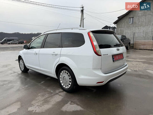 Белый Форд Фокус, объемом двигателя 1.8 л и пробегом 205 тыс. км за 5700 $, фото 5 на Automoto.ua