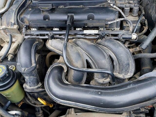 Білий Форд Фокус, об'ємом двигуна 1.6 л та пробігом 211 тис. км за 5500 $, фото 6 на Automoto.ua