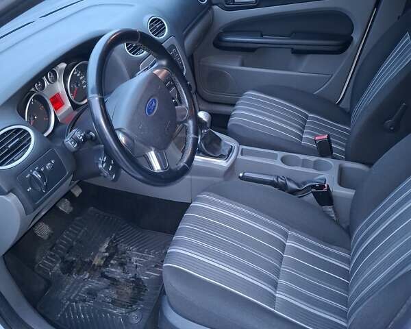 Белый Форд Фокус, объемом двигателя 1.6 л и пробегом 290 тыс. км за 6700 $, фото 13 на Automoto.ua