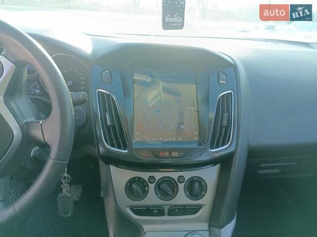 Белый Форд Фокус, объемом двигателя 1.56 л и пробегом 325 тыс. км за 5950 $, фото 14 на Automoto.ua