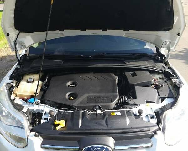 Білий Форд Фокус, об'ємом двигуна 1.59 л та пробігом 288 тис. км за 6001 $, фото 1 на Automoto.ua